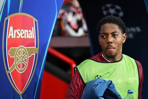 Myles Lewis-Skelly in a bib.