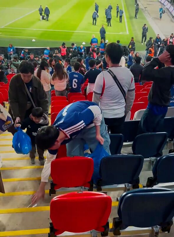Japan's football fans clear up their rubbish
