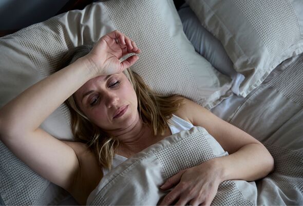Menopausal woman suffering insomnia