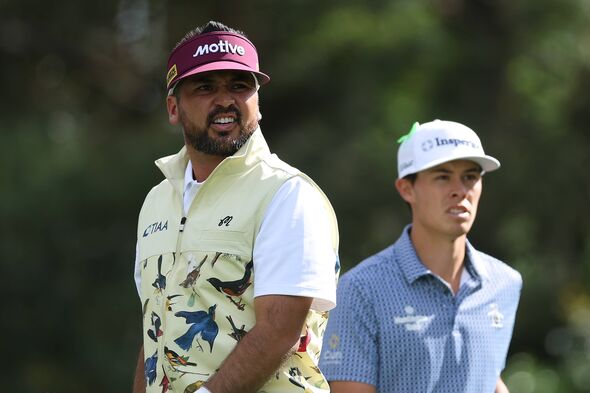 Jason Day of Australia and Johnny Keefer