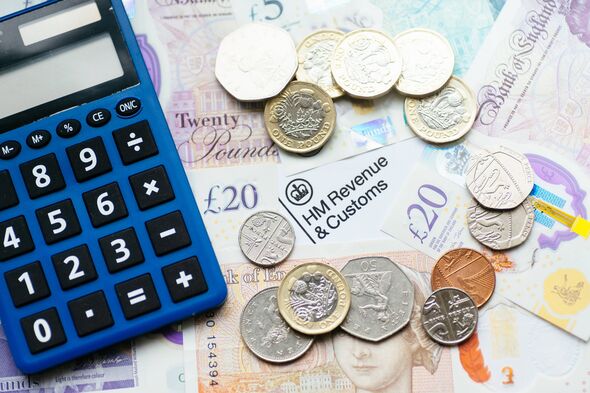 British pound banknotes and coins with HM Revenue & Customs document, representing taxation, personal finance, government revenu