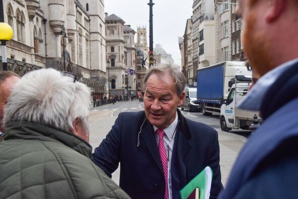 Rupert Lowe speaks to people on the street