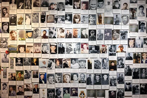 Photos on museum wall of those who died in 1982