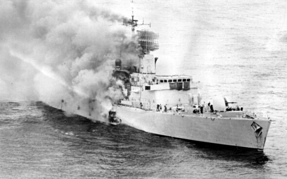 HMS Sheffield smokes after being hit by missile