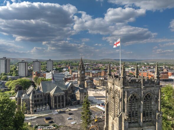Rochdale Town Hall with St Chads Church in The South Pennines