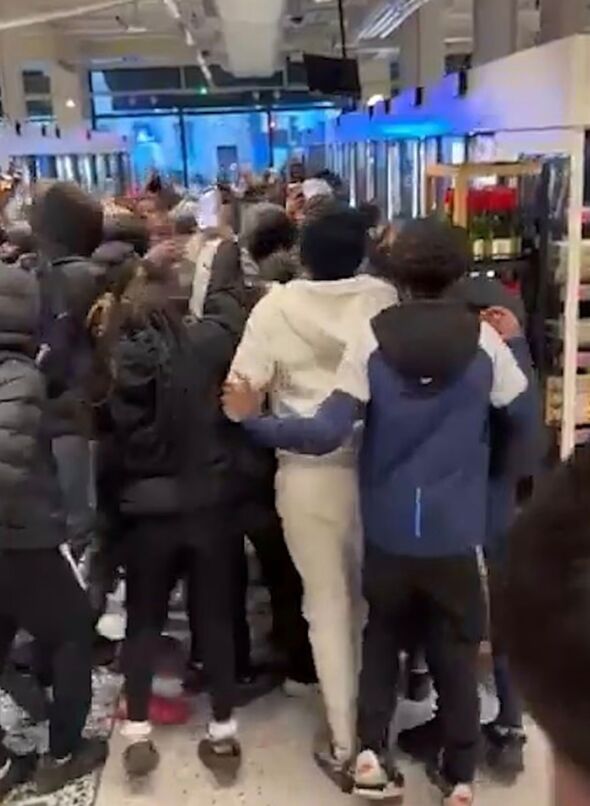 Youths taking over Marks and Spencer