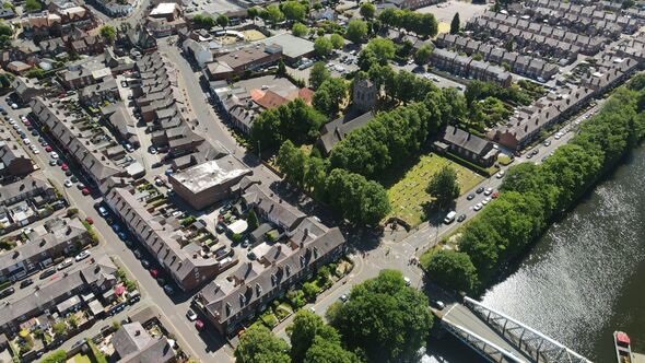 Aerial view of the skyline of Stockton Heath, Warrington with the Manchester ship canal