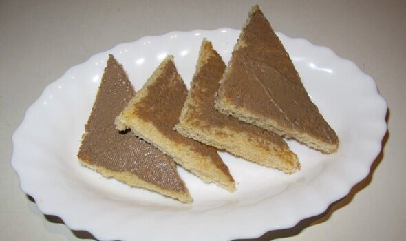 Gentleman's relish spread on triangles of toast