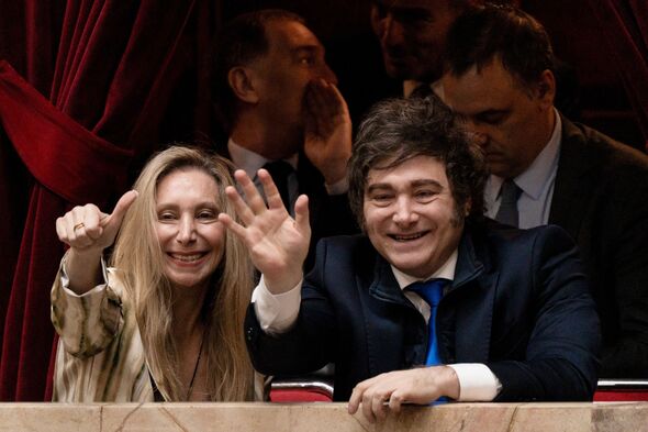 President Milei waves from balcony