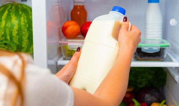 Picture of full fat milk coming out of the fridge