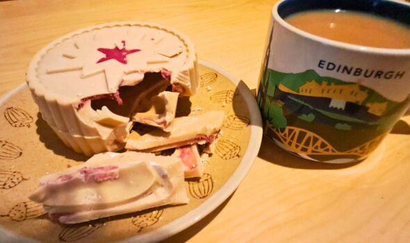 Picture of the inside of the Jammy Wheel Easter egg with a cup of tea
