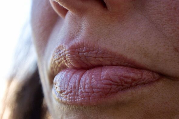 Extreme Close-Up Woman's Closed Mouth