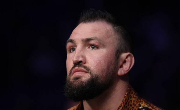 Hughie Fury looks on from ringside during a fight