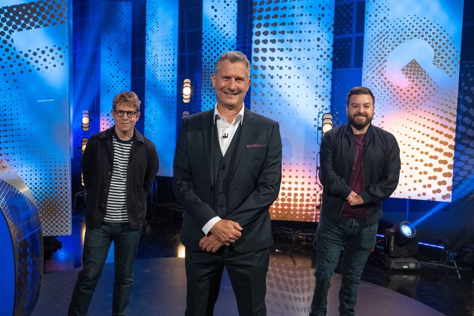 Publicity image of Alex Brooker, Adam Hills And Josh Widdicombe posing together for The Last Leg