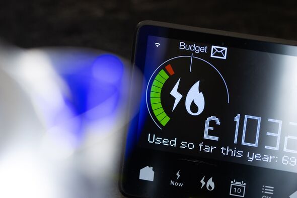 British smart meter behind boiling kettle
