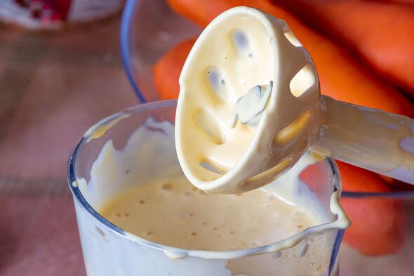 mayo home made close up view. Homemade mayonnaise made by organic eggs with yellow yolk. Making mayo