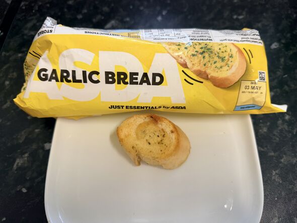 Asda garlic baguette packet with slice on kitchen counter