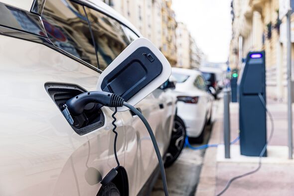 Electric car charging at the electric station on the street