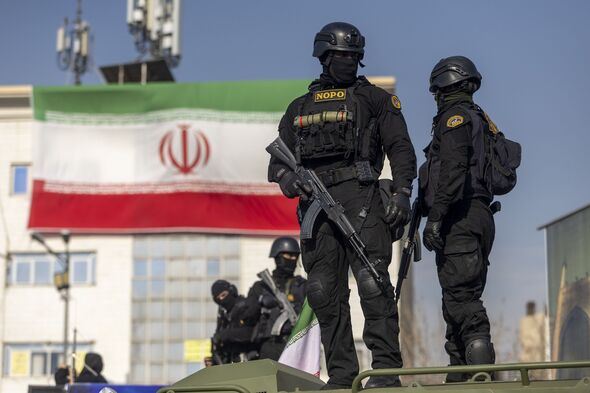 Pro-Government Rally Held In Iran As Regime Rejects Threats Of Western Intervention