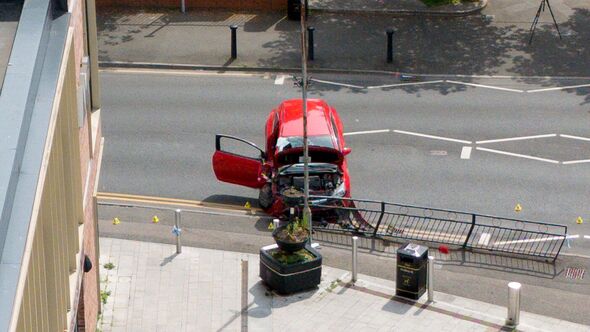 Aerial view of the crashed car which was abandoned on the road