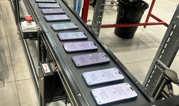Phones on a conveyor belt