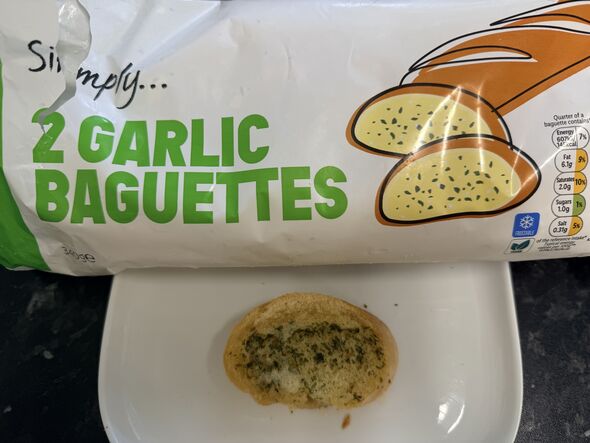 Simply garlic baguette packet and slice on kitchen counter