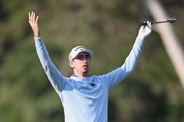 Tom McKibbin with his arms up