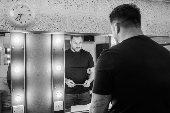 A man looking in a mirror