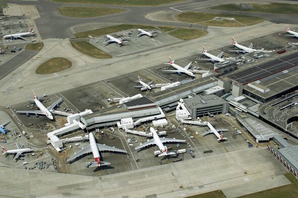 Planes waiting at Heathrow airport, aerial view