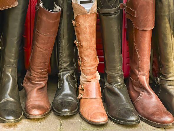 Assorted Vintage Leather Boots at an Outdoor Flea Market