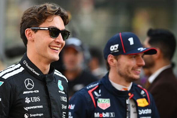 George Russell and Max Verstappen are both smiling