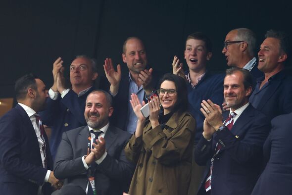William with friends at football match