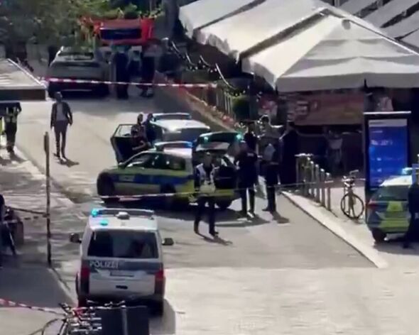 A police cordon has been set up around the car involved in the crash