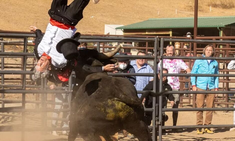 Johnny Knoxville flying off a bull