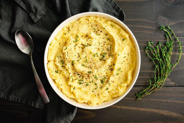 Roasted Garlic Mascarpone Mashed Potatoes with Fresh Thyme and Black Pepper