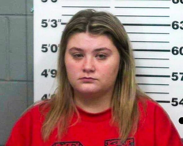 Trinity Poague, 18, is seen in her mugshot