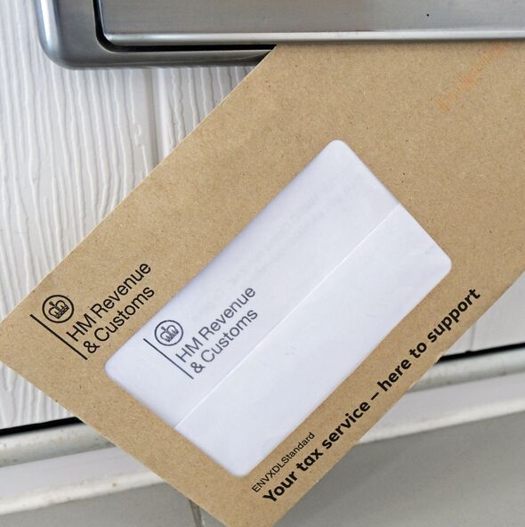Tax demand letter coming through mail box in door