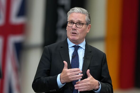 Keir Starmer speaks in suit and tie