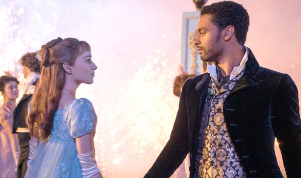 A woman and a man dance together