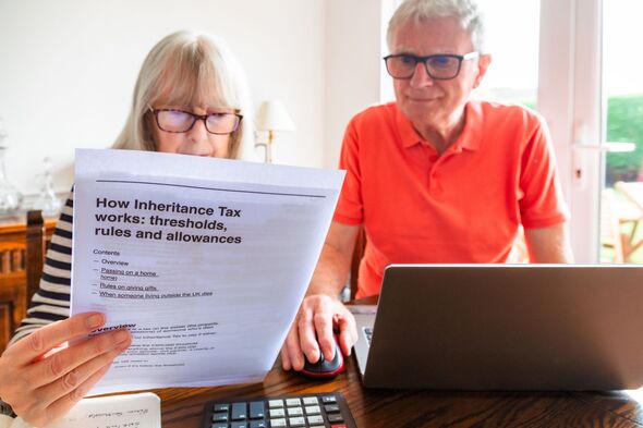 Worried senior couple looking at inheritance tax documents at home