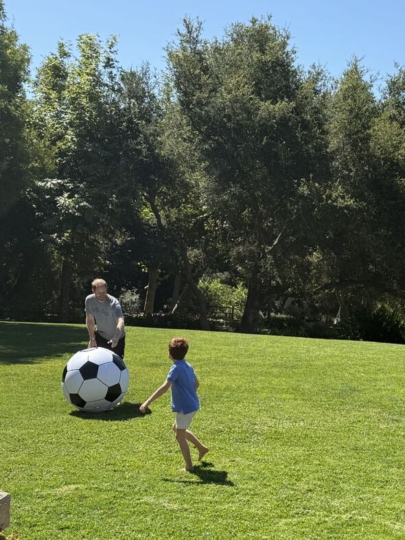 Prince Harry playing with Prince Archie