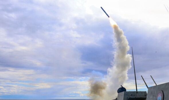 A US warship launches a missile during the war