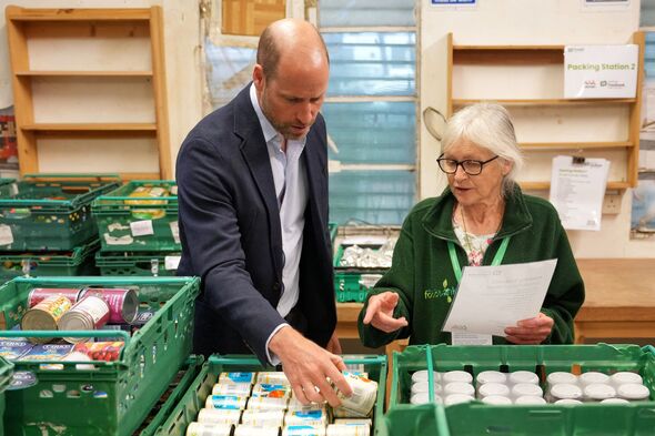 Prince William holds items to be packed
