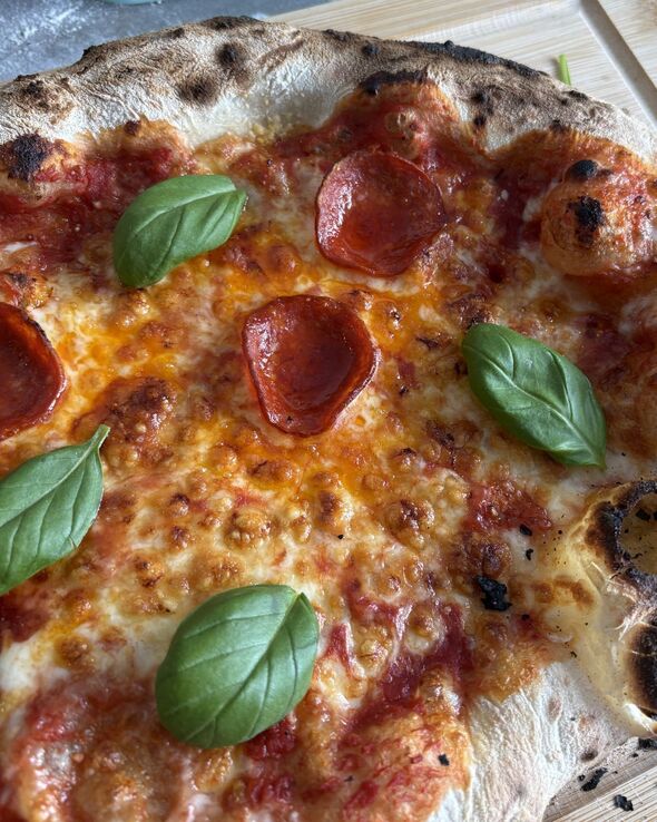 Pizza cooked on the pizza oven