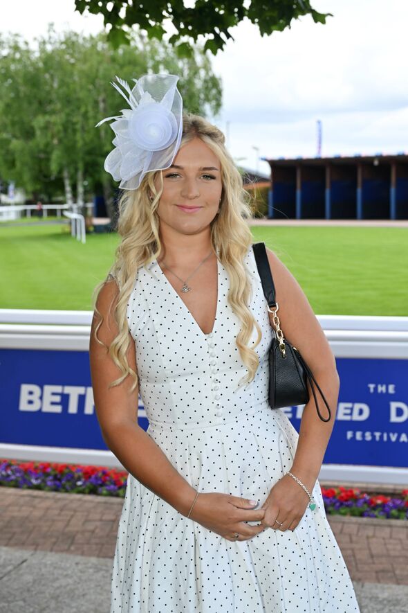 EPSOM, ENGLAND - JUNE 05: Harriet Cowan joins The Jockey Club at Epsom Downs Racecourse for Ladies Day at The Betfred Derby Fest