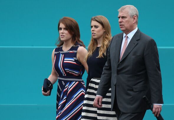Andrew pictured previously with his daughters