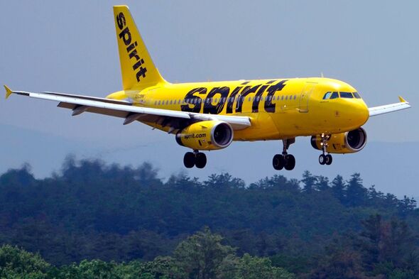 A yellow airplane branded with the word