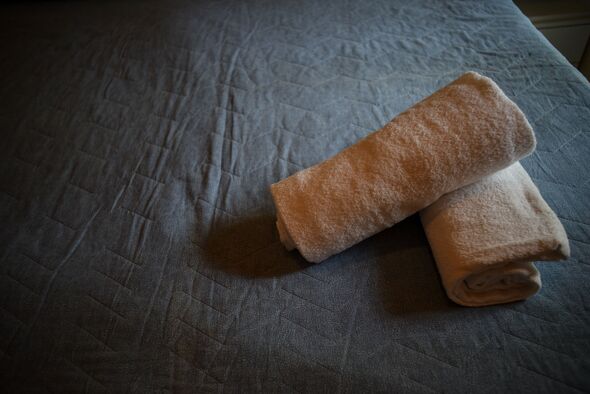 Towels on bed
