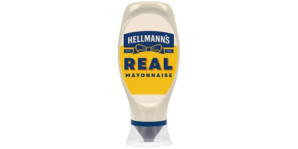 A bottle of Hellman's Real Mayonnaise standing on its lid on a white background