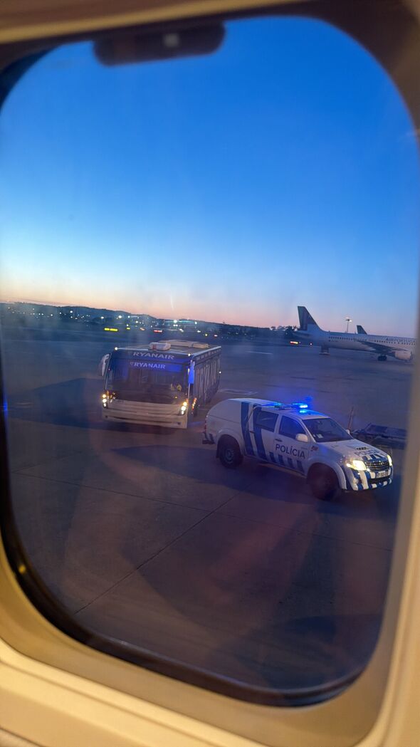 A screenshot from a TikTok clip posted by Vilte of the emergency landing in Lisbon shows an ambulance waiting on the runway